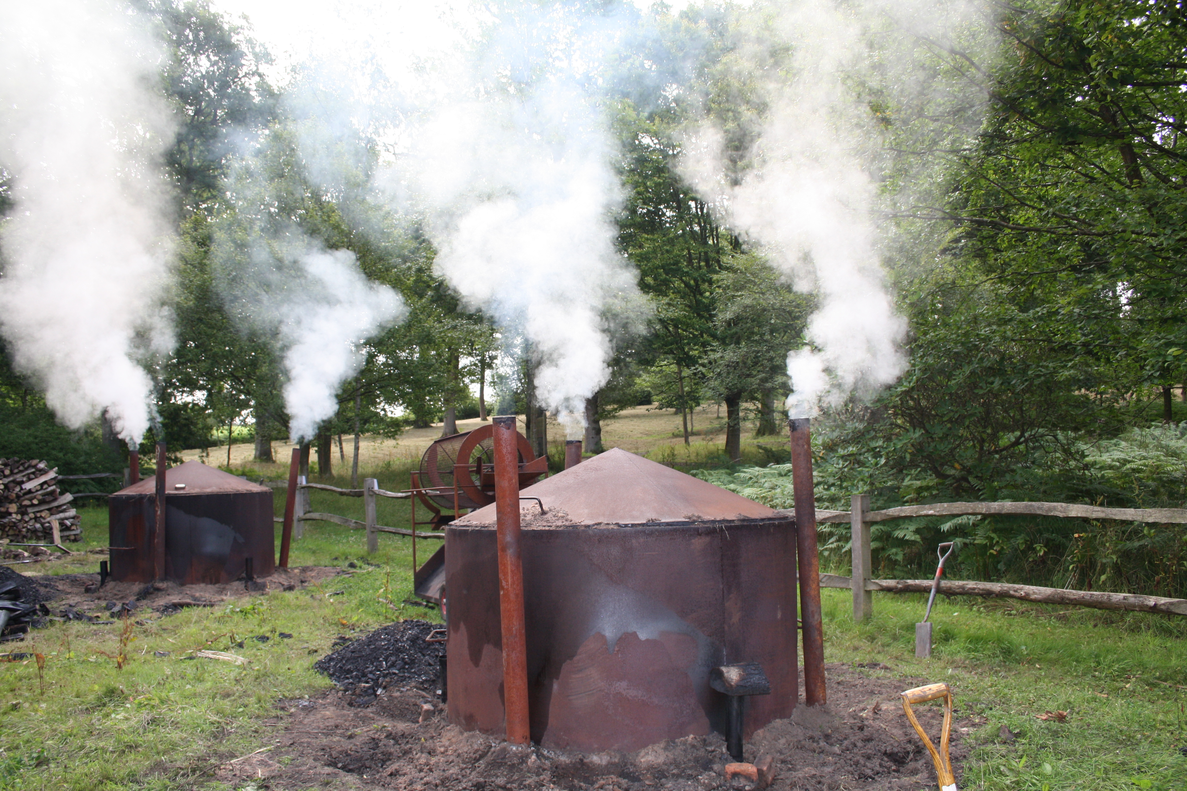Kilns at Wakehurst during the charcoal making process © RBG Kew