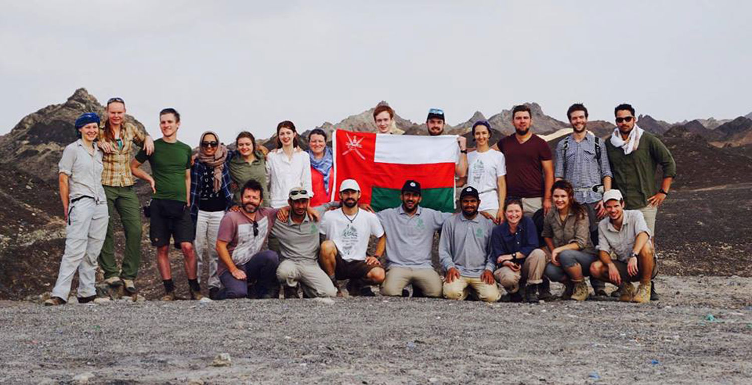 21 researchers from the UK and Oman Botanic Gardens stood with the Oman flag
