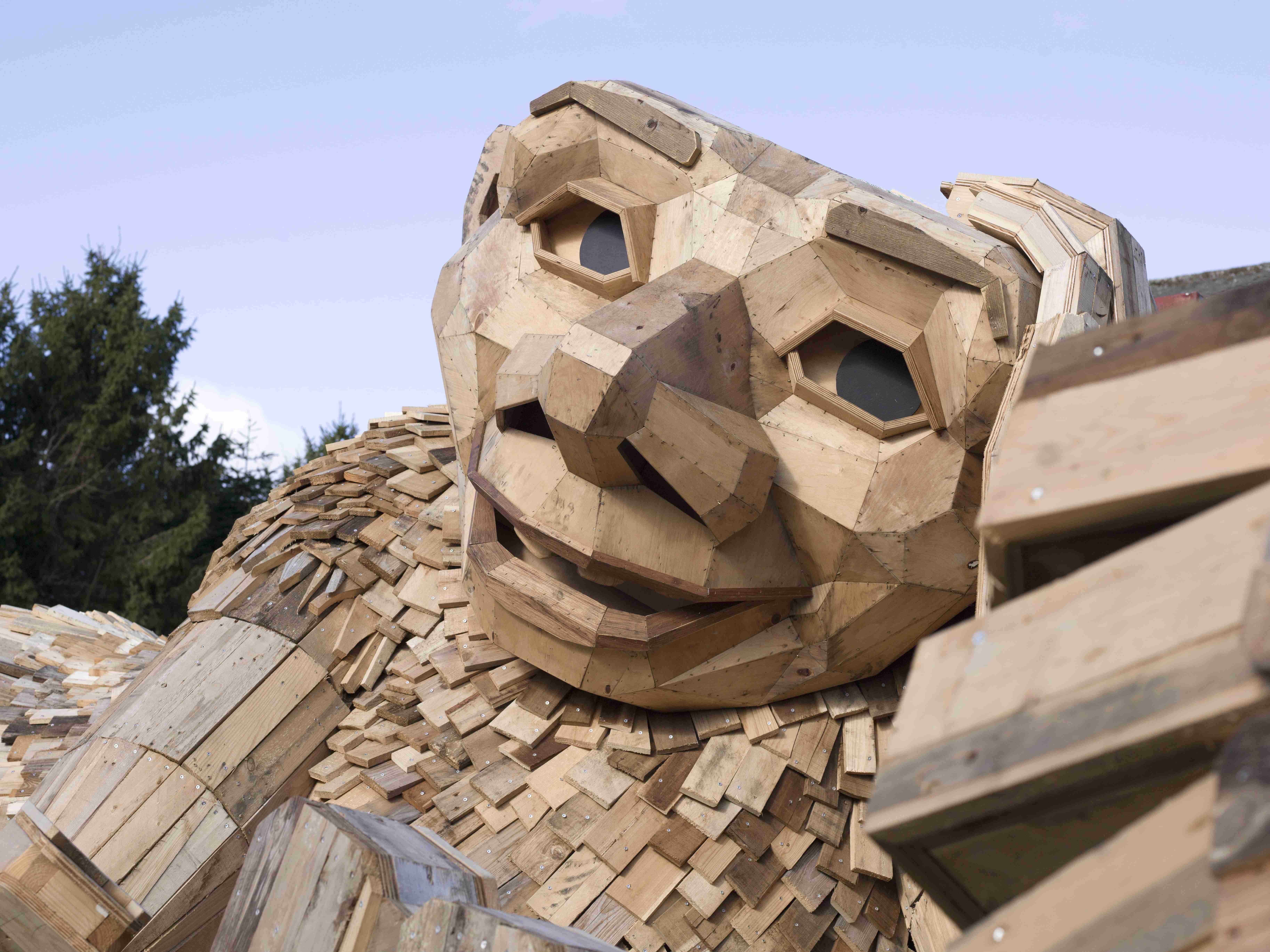 Giant, wooden, smiling troll