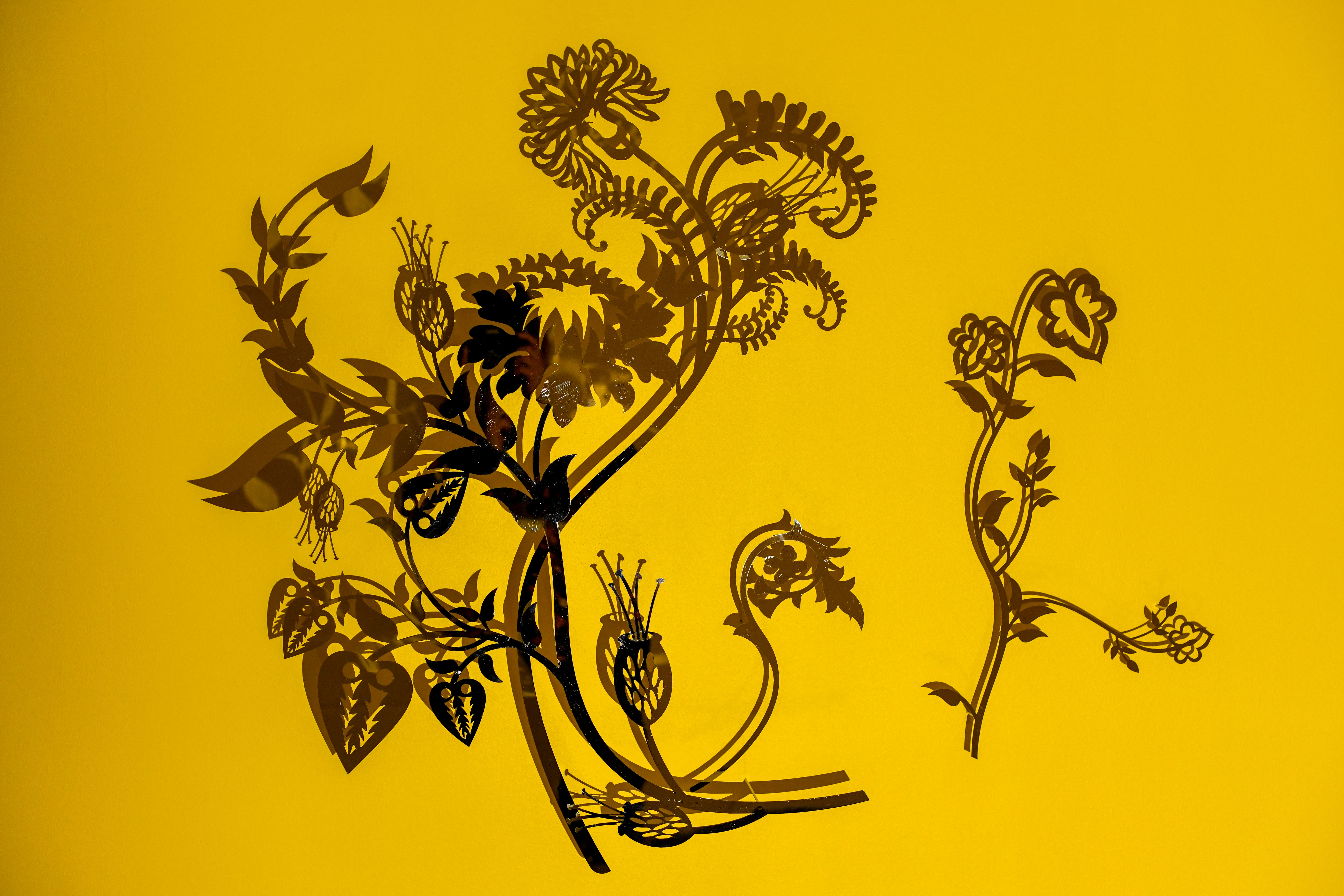 Steel wall-mounted piece consisting of a variety of wild plants