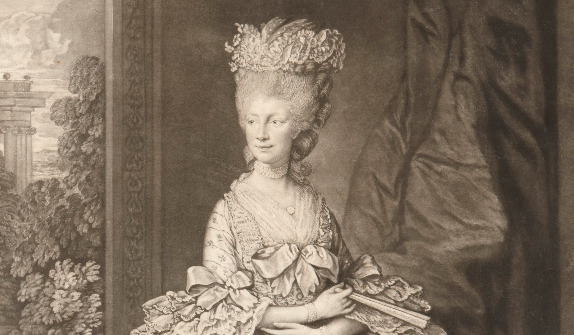 Black and white full length portrait of Queen Charlotte, elaborate dressed and smiling with a papillon spaniel at her feet