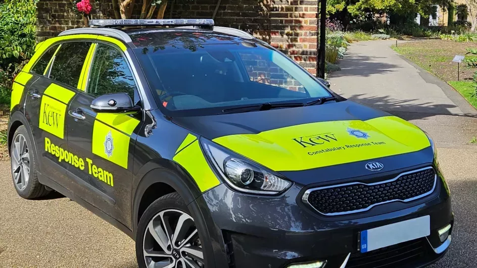 A photo of the Kew Constabulary response vehicle which is a black car with neon yellow stripes