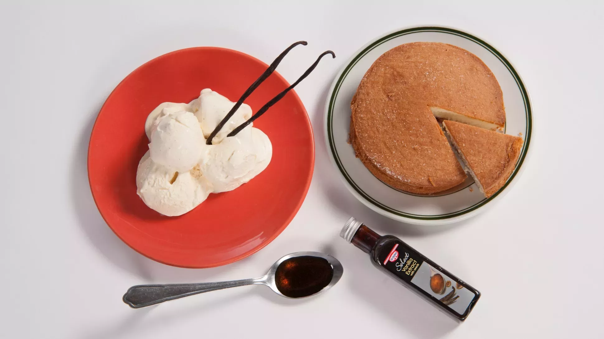 Some ice cream, a cake and a bottle of vanilla extract